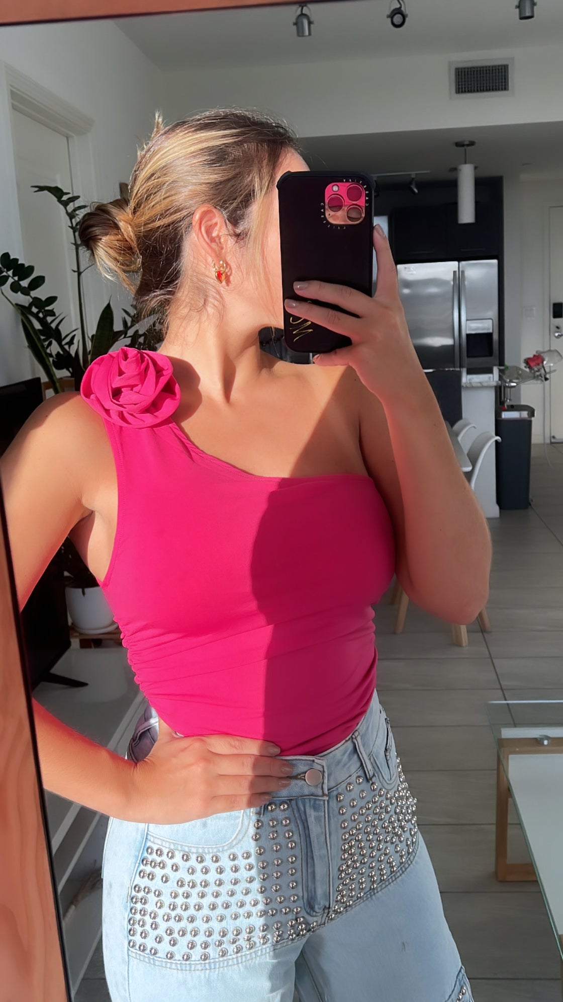 Top. asymmetric top with flower