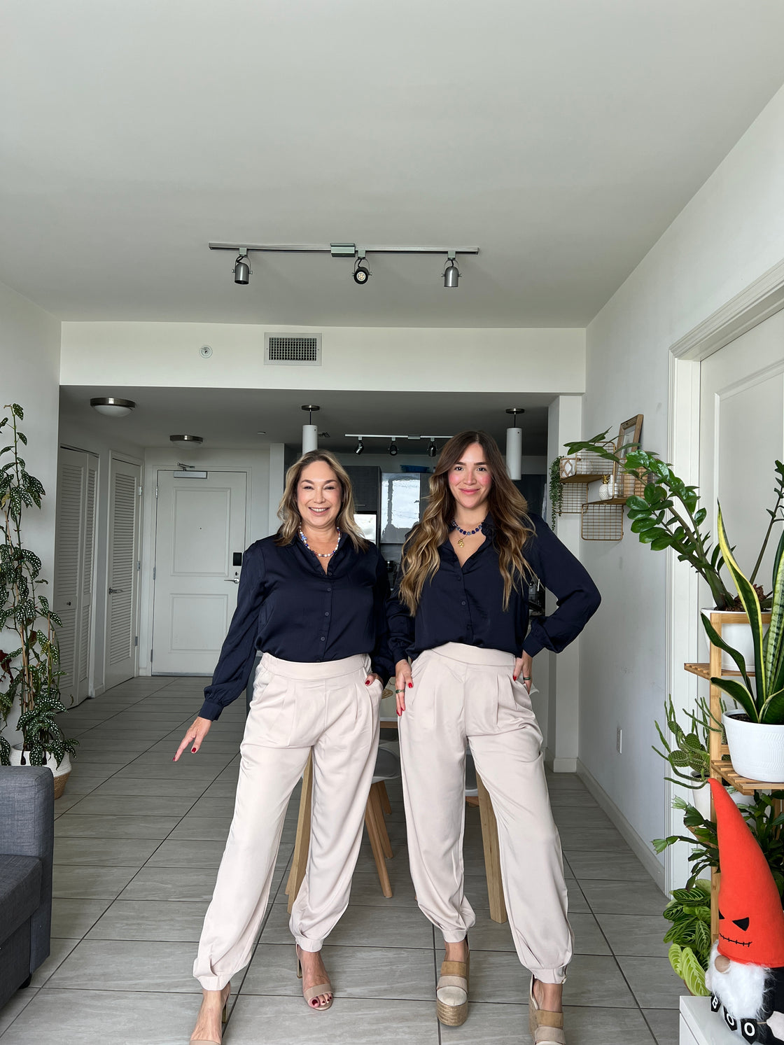 Pants. Beige trousers with ruched detail on the boot