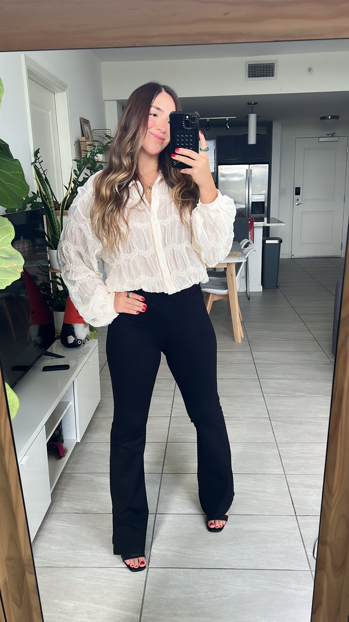 Pants. Khaki and black stretch pants with detail on the boot