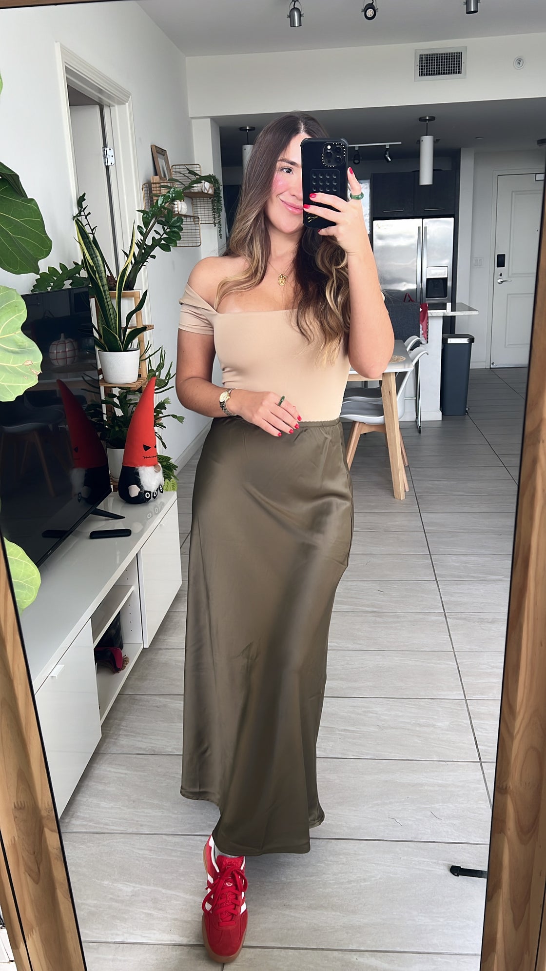 Long satin skirt in olive green and nude colors