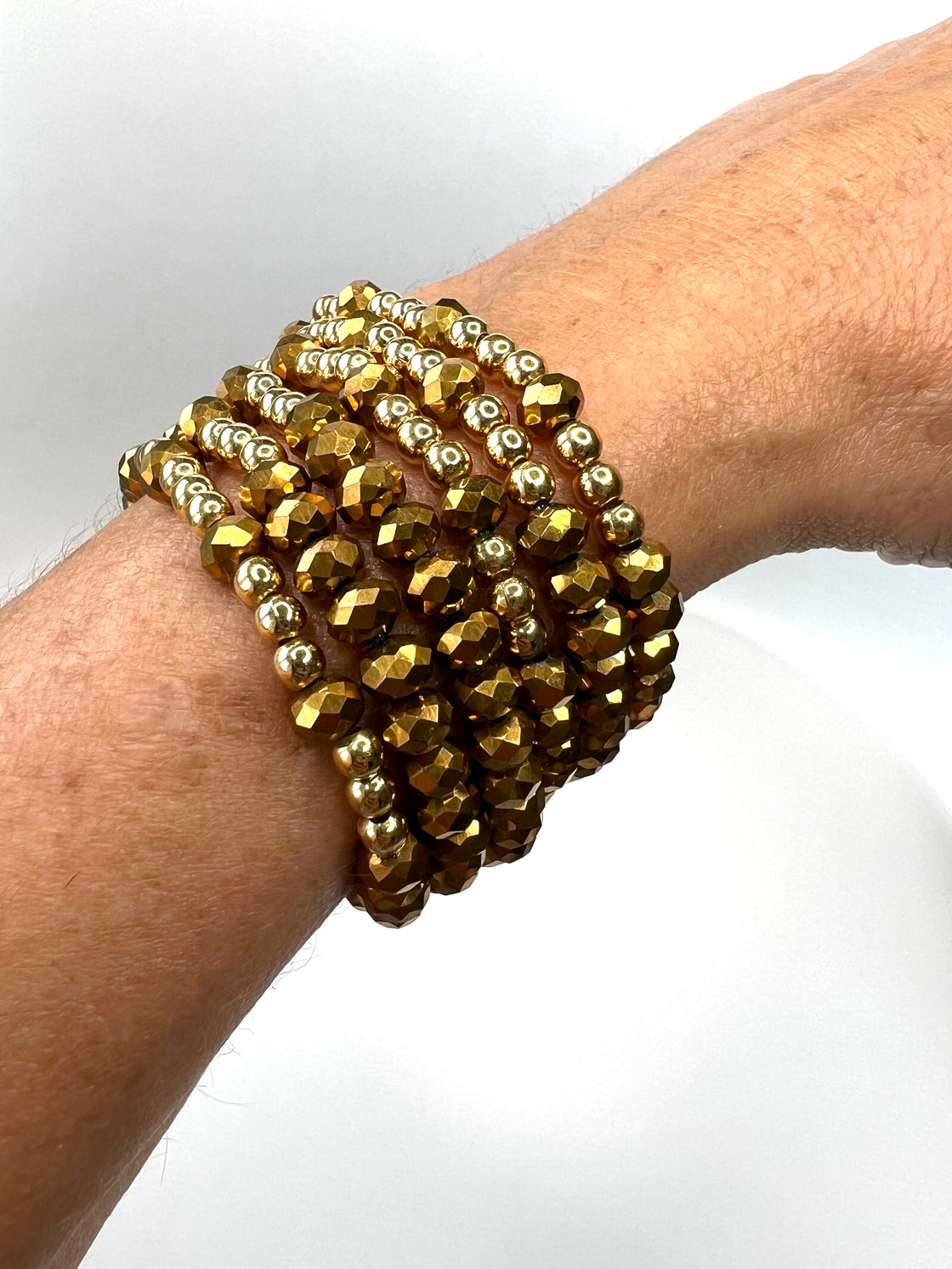 Set crystal and gold-plated ball bracelets