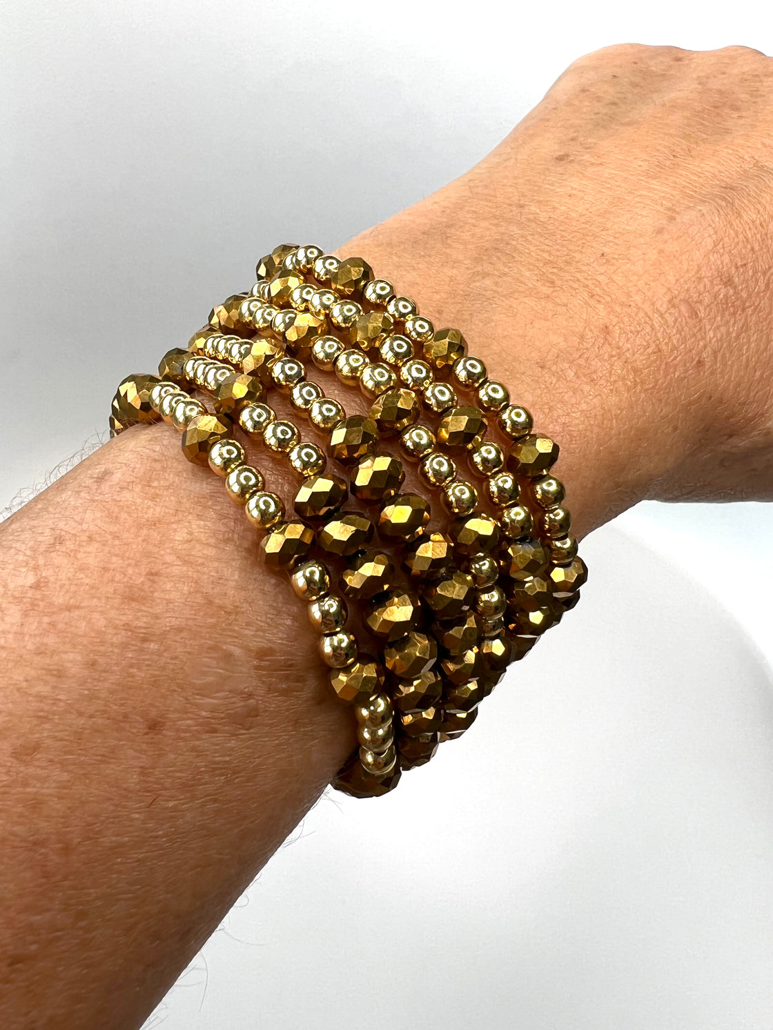 Set crystal and gold-plated ball bracelets