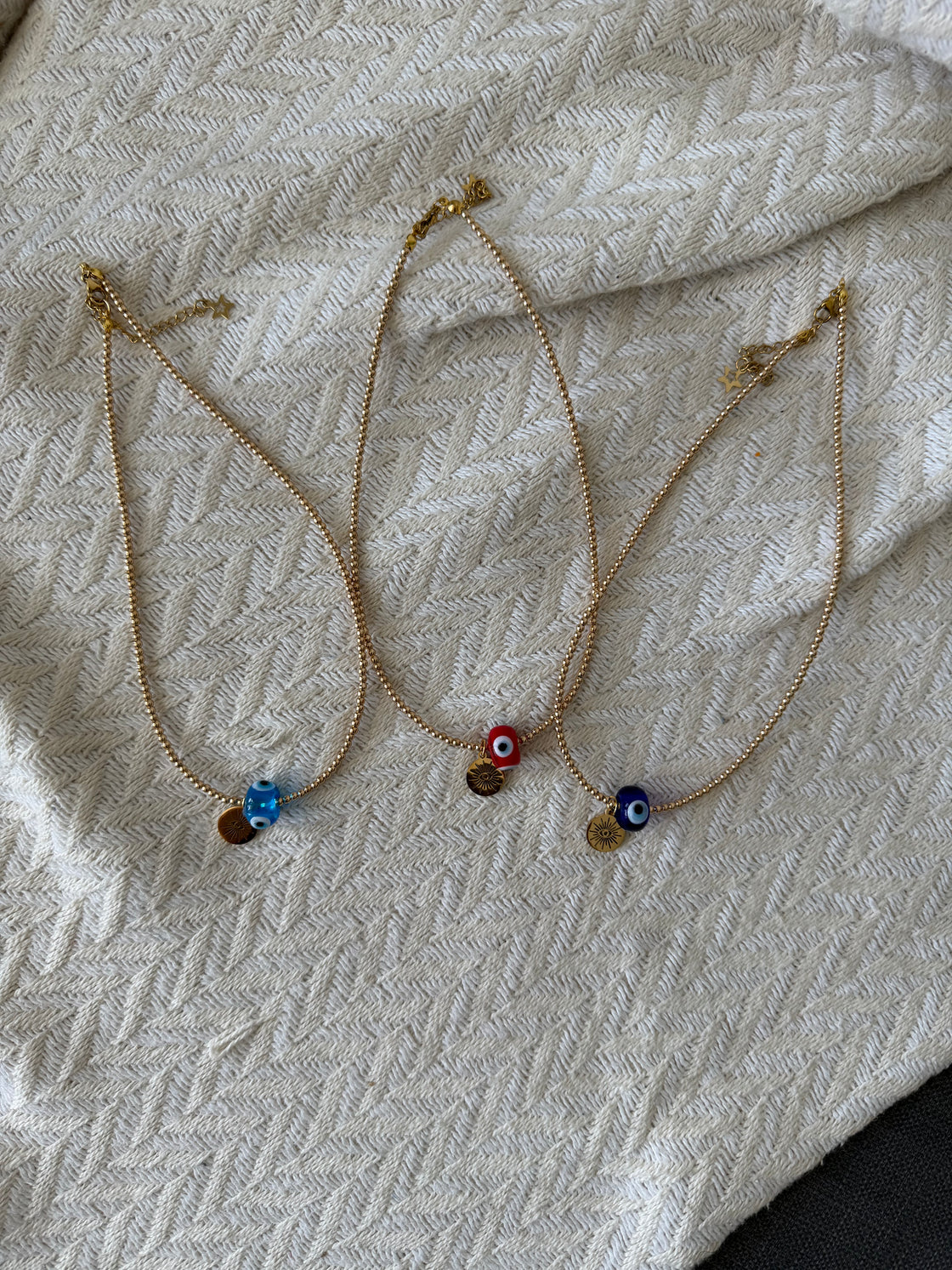 Necklace in natural hematite stone, pendant in stained glass and stainless steel