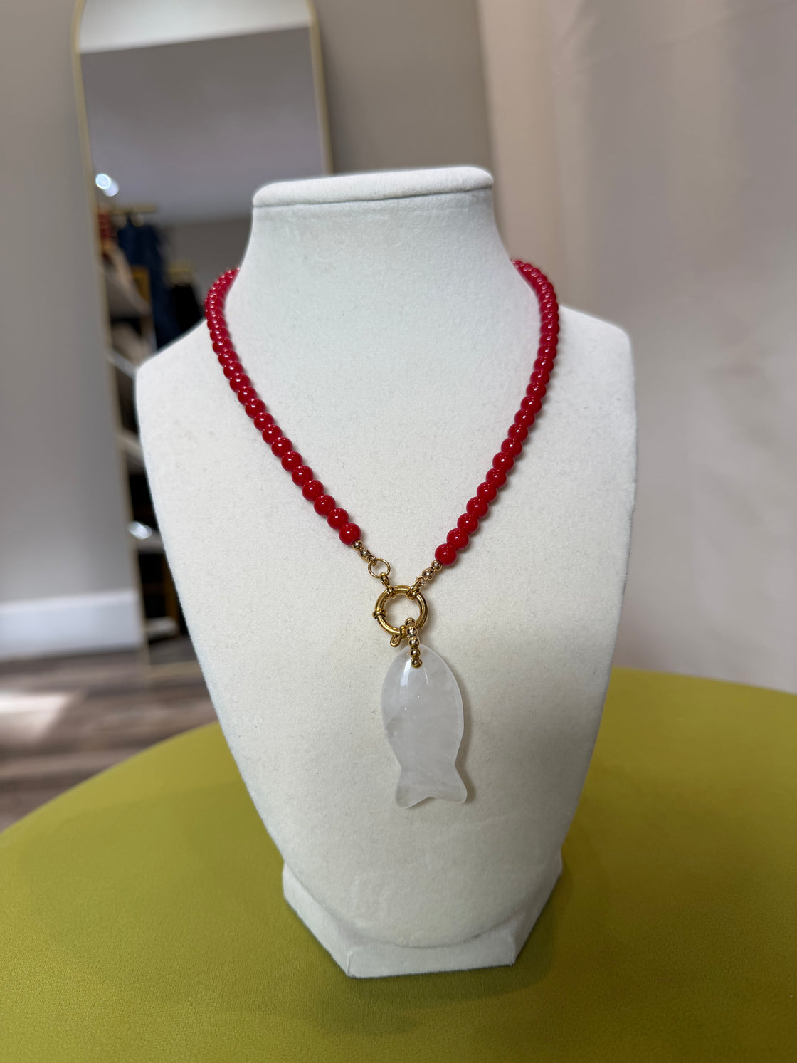 Semiprecious stone necklace with a fish-shaped pendant