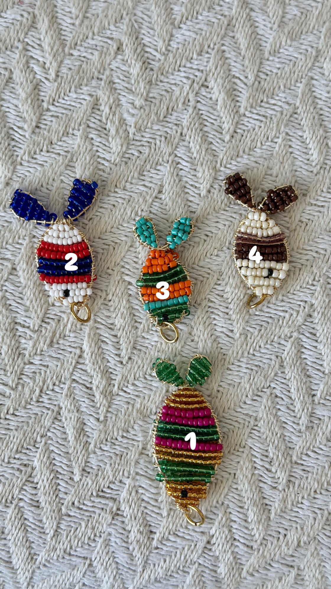 Natural stone necklace with a handmade fish-shaped pendant.